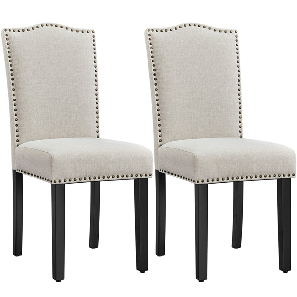Upholstered Linen Dining Chairs with Nailhead Trim — detail view