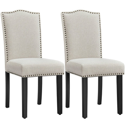 Upholstered Linen Dining Chairs with Nailhead Trim — detail view