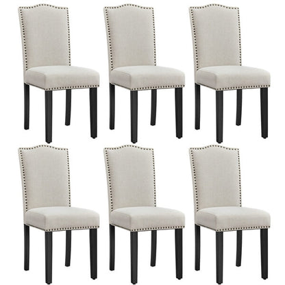 Upholstered Linen Dining Chairs with Nailhead Trim — side view