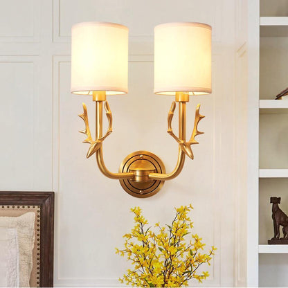 Brass Deer Head Wall Light with Warm LED Glow — side view