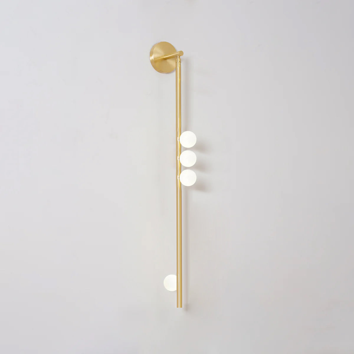Brass Glass Tube Wall Lamp with Adjustable Lighting — lifestyle view