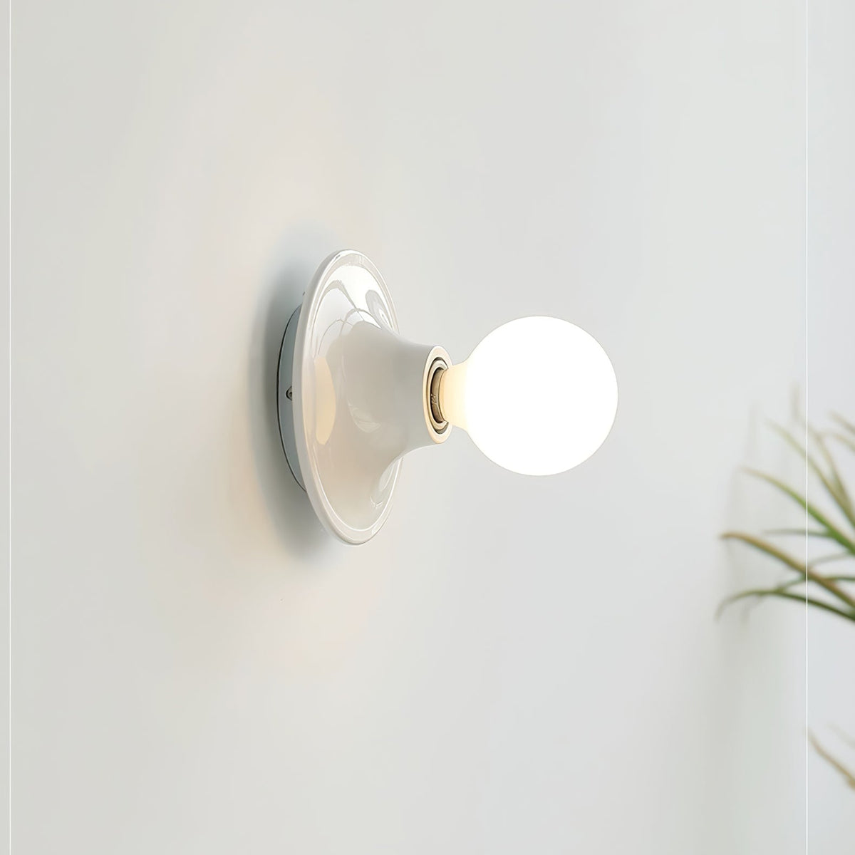 Glass Bulb Wall Sconce with Adjustable Lighting