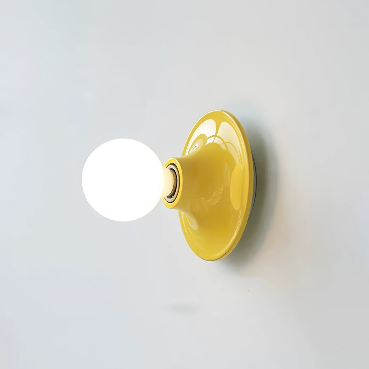 Glass Bulb Wall Sconce with Adjustable Lighting — lifestyle view