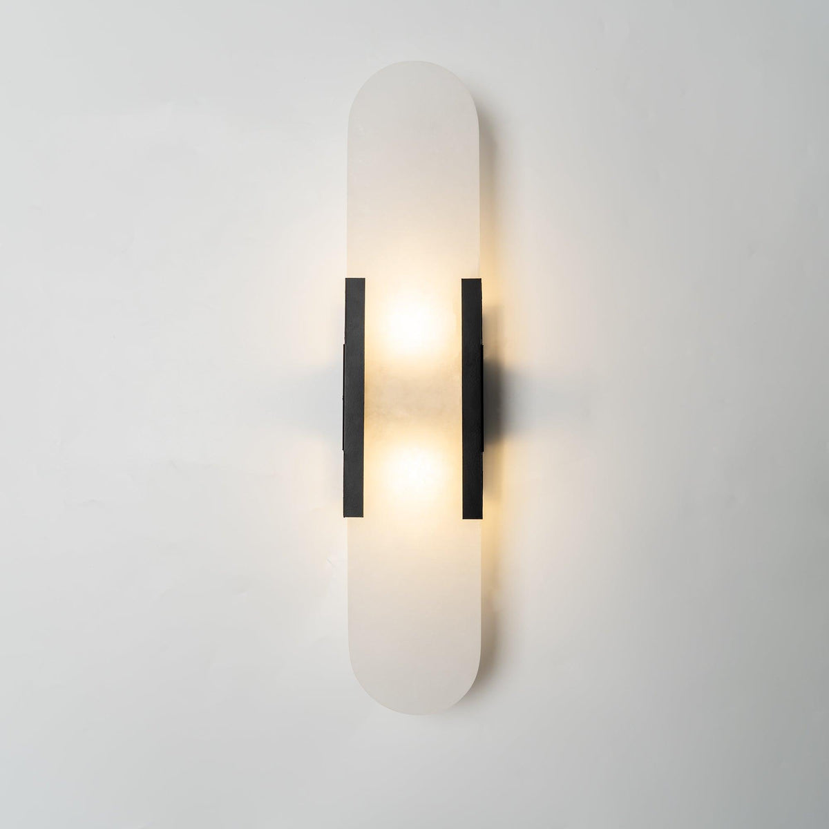 Oblong Alabaster Wall Sconce, Soft Ambient Light — lifestyle view
