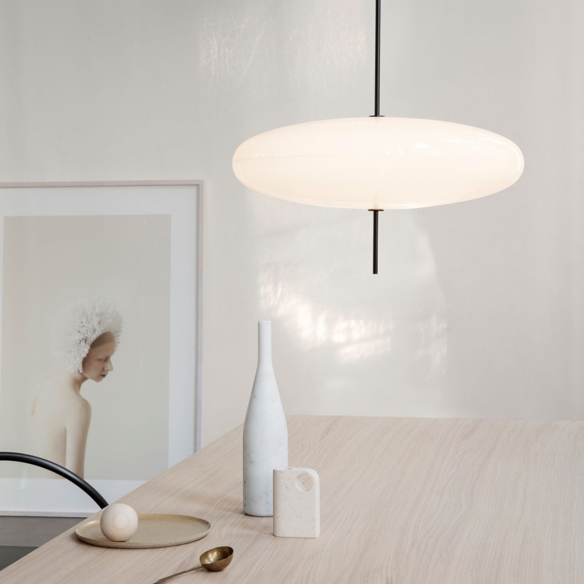 Opal Disc Suspension Lamp, Soft Ambient Light — lifestyle view